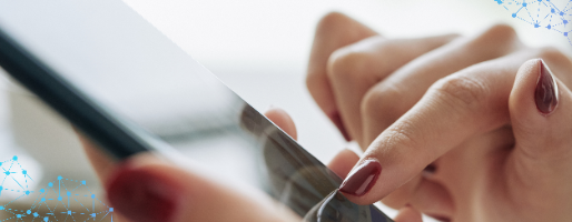 woman's hands typing on phone