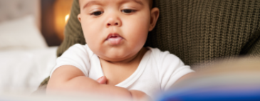 parent reading to baby